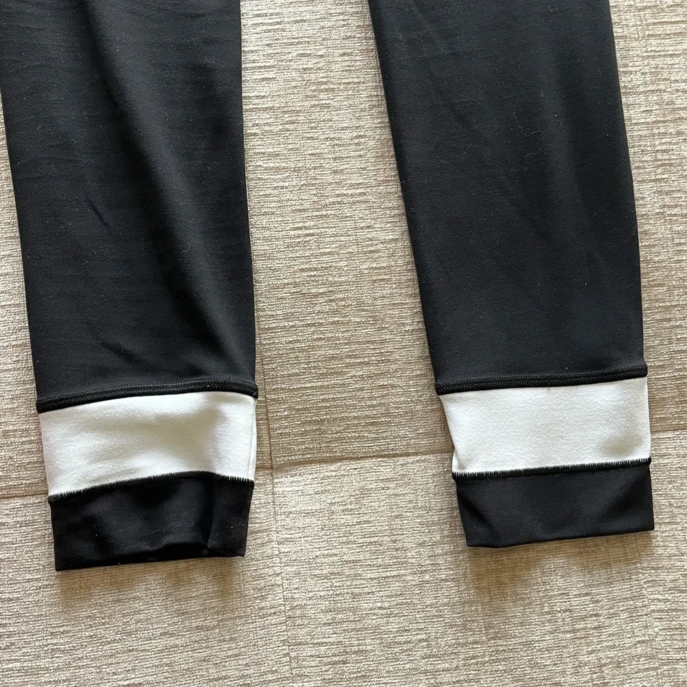 Athleta Black Leggings with White Waistband and Cuff Accents - Picture 6 of 6